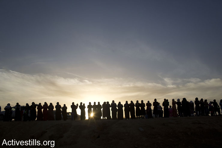 Bedouin residents of the “unrecognized” village of Al Arakib protest the demolition of their village and demand the release of the activists arrested during an anti-Prawer demonstration the day before, in Lehavim Junction, December 1, 2013. The village of Al Arakib was demolished by the Israeli authorities over 60 times, as the Jewish National Fund is planting a forest on the village’s lands (Photo: ActiveStills)
