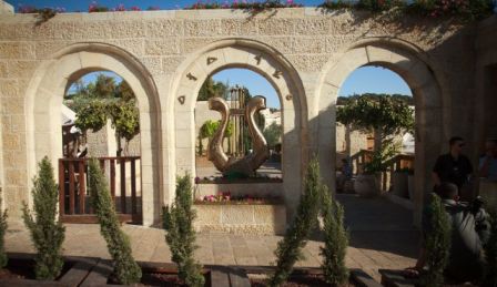 Enter the City of David. Hear harps playing 