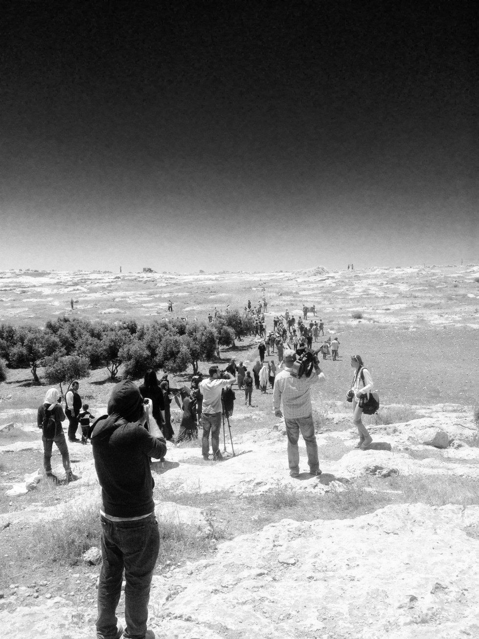 The residents and supporters from all over the West Bank then began to march, holding Palestinian flags
