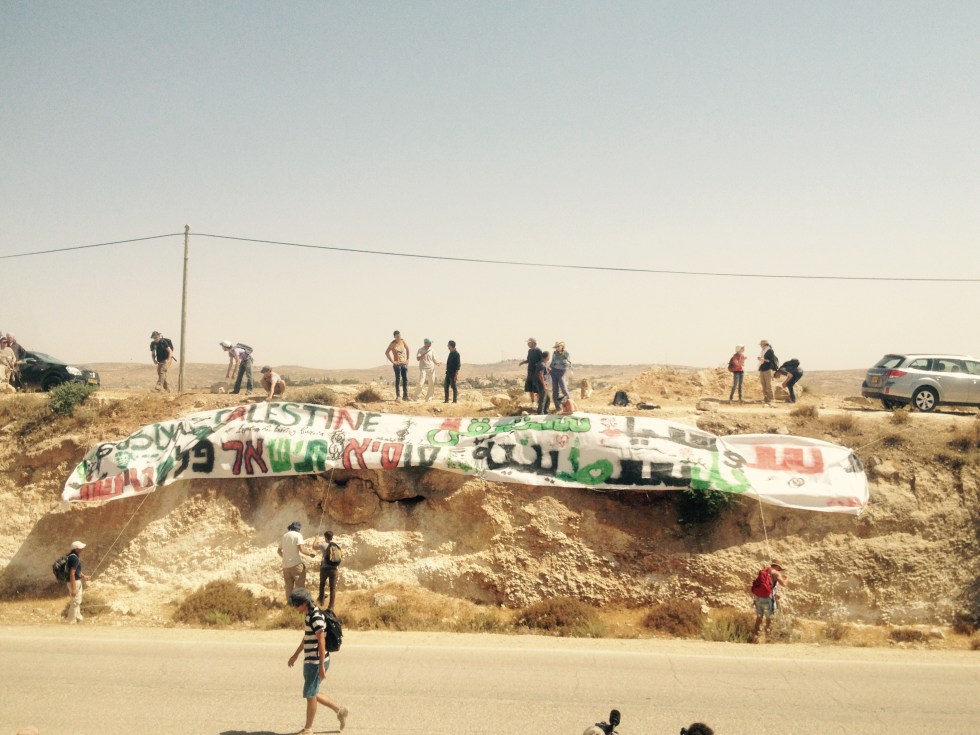 As a final act of solidarity and defiance, residents of Susiya and supporters hung a huge banner that read: "Susiya will remain Palestinian." 